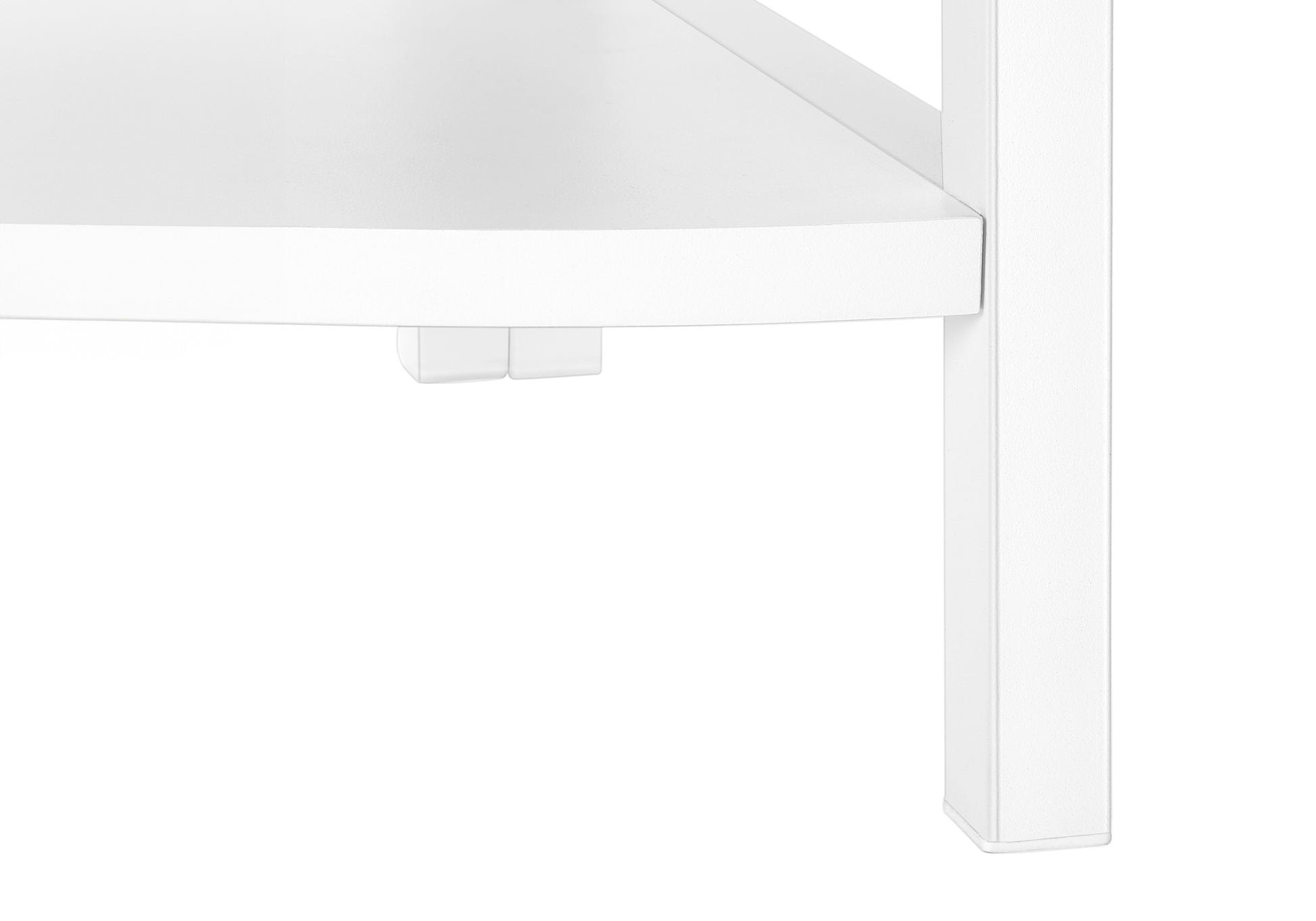 White metal table leg detail with shelf support