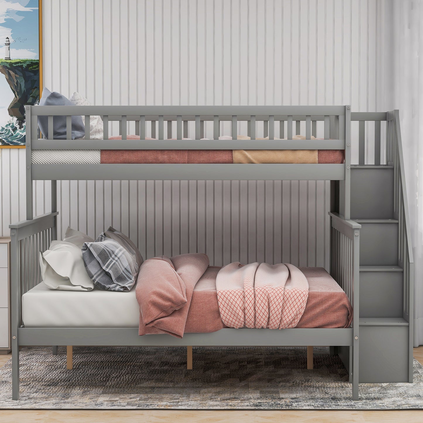 Gray wooden twin over twin bunk bed with stairs and storage