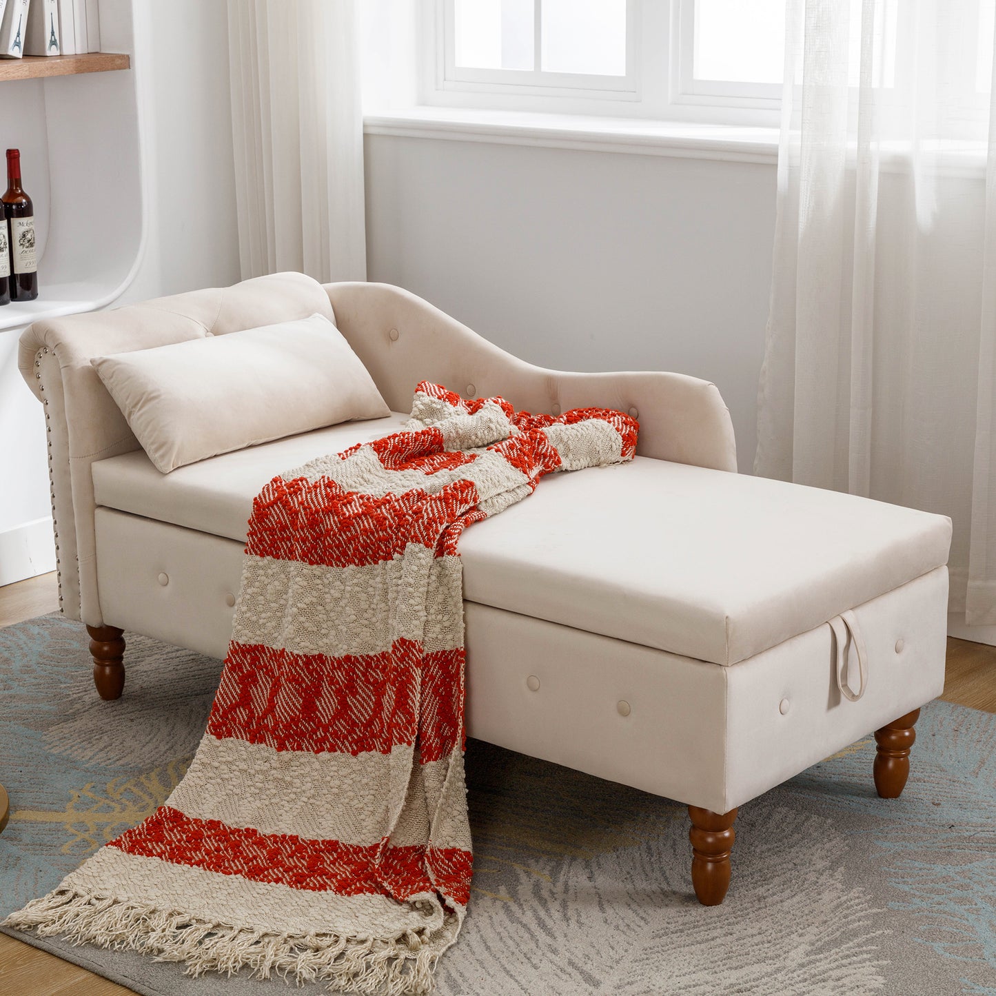 Beige velvet chaise lounge with tufted accents and storage ottoman