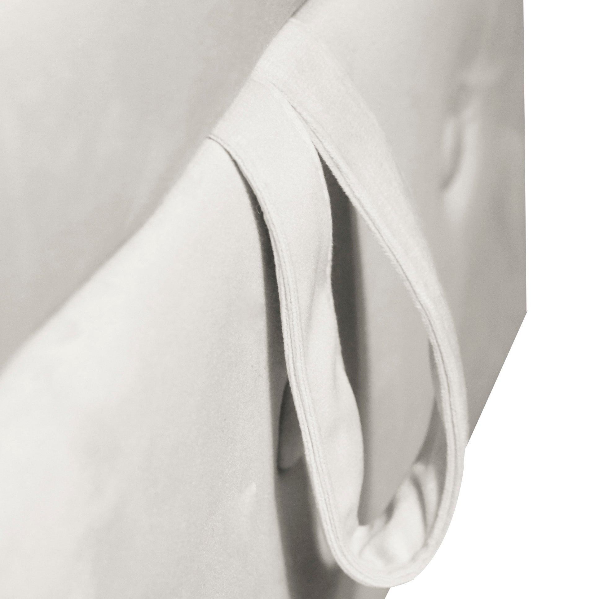 Closeup of offwhite fabric straps for a versatile tote bag