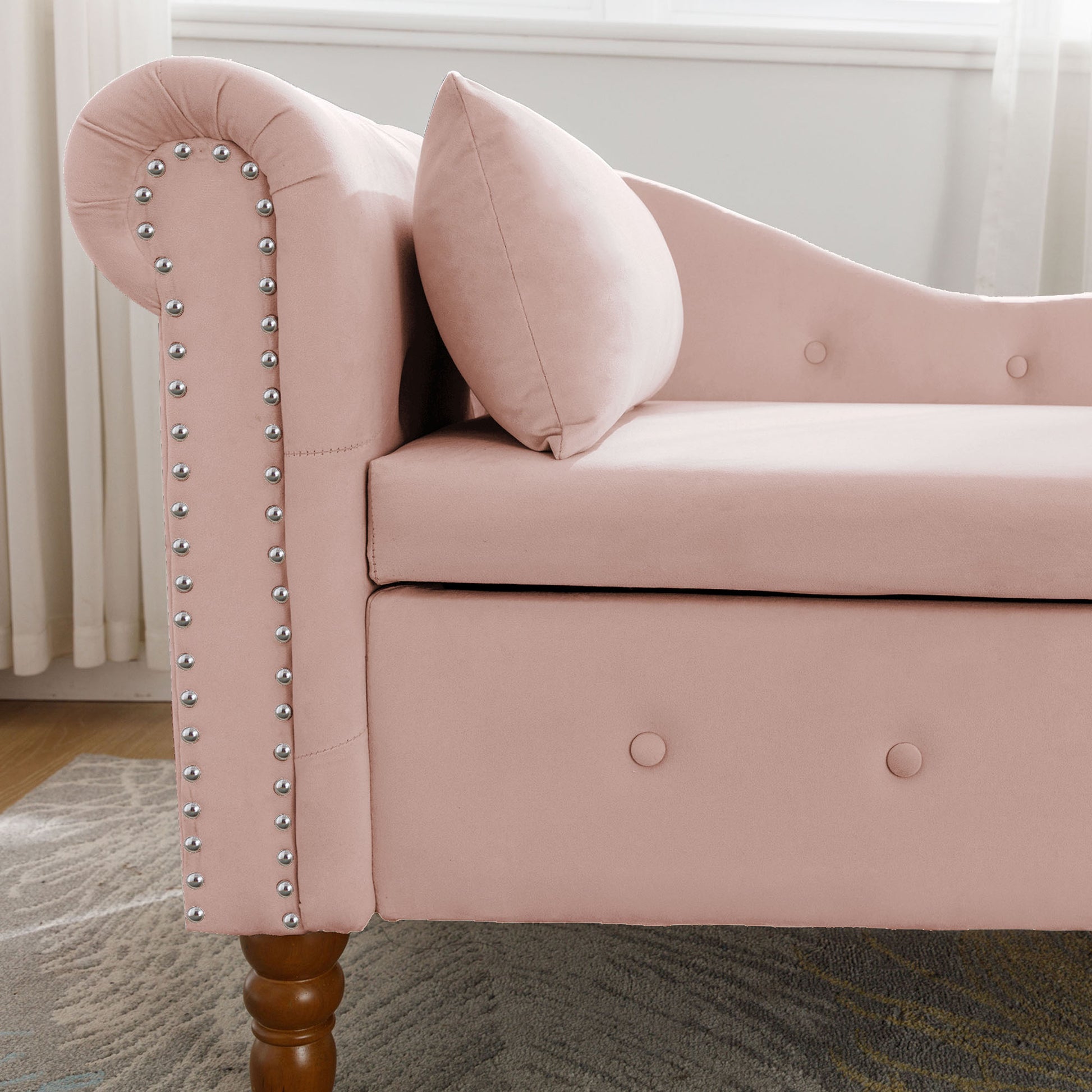 Pink velvet chaise lounge with silver nailhead trim
