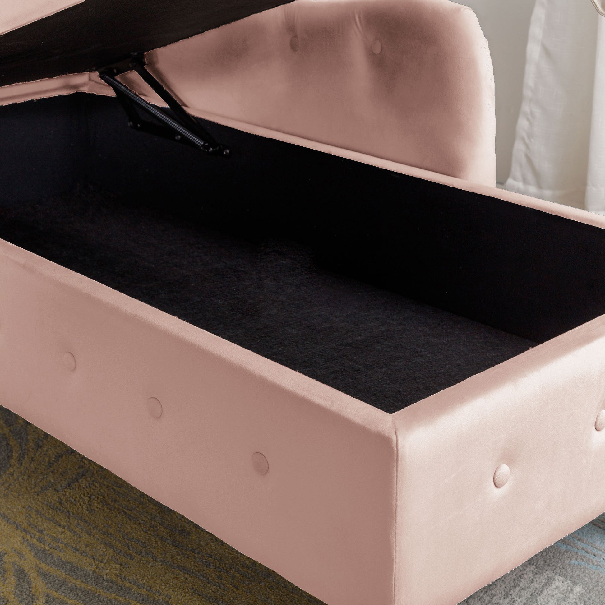 Dusty rose velvet storage ottoman with tufted details and lifttop mechanism