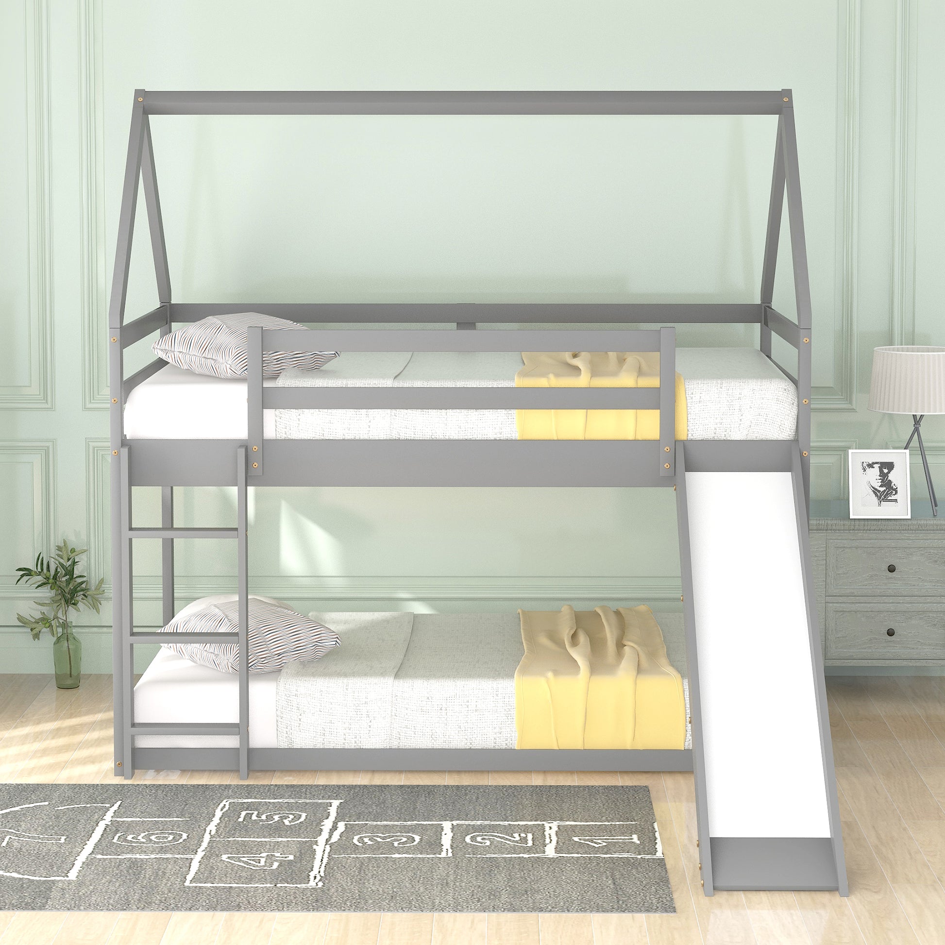 Grey wooden twin over twin bunk bed with slide and ladder