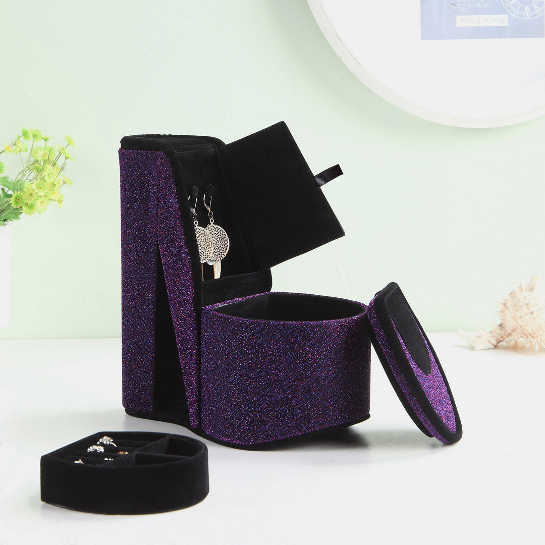 Sparkly purple jewelry box with earring hooks and ring tray