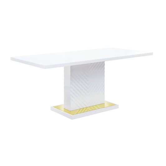 Modern white dining table with a textured pedestal base and gold accent
