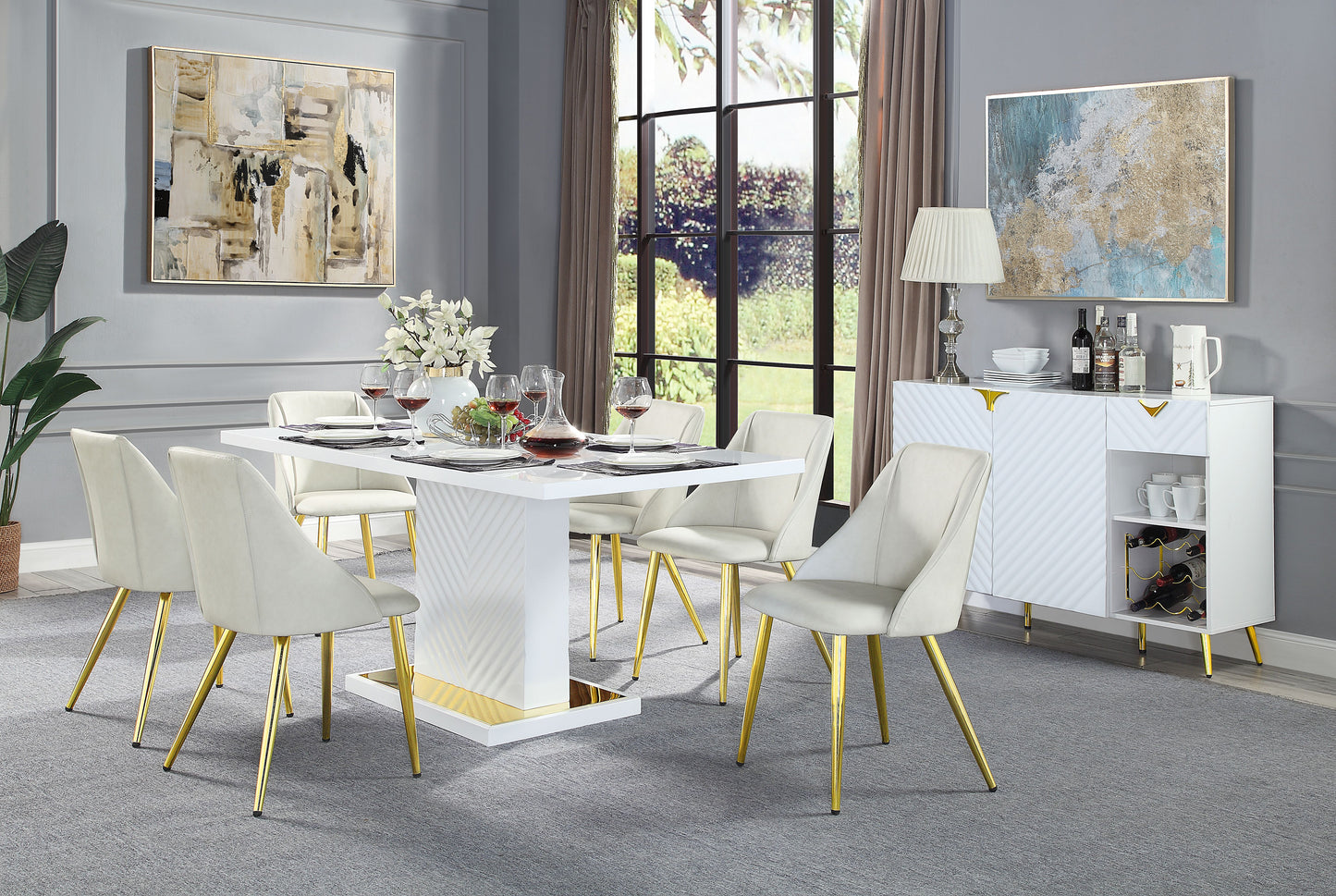 White lacquer dining table with gold accents and upholstered chairs