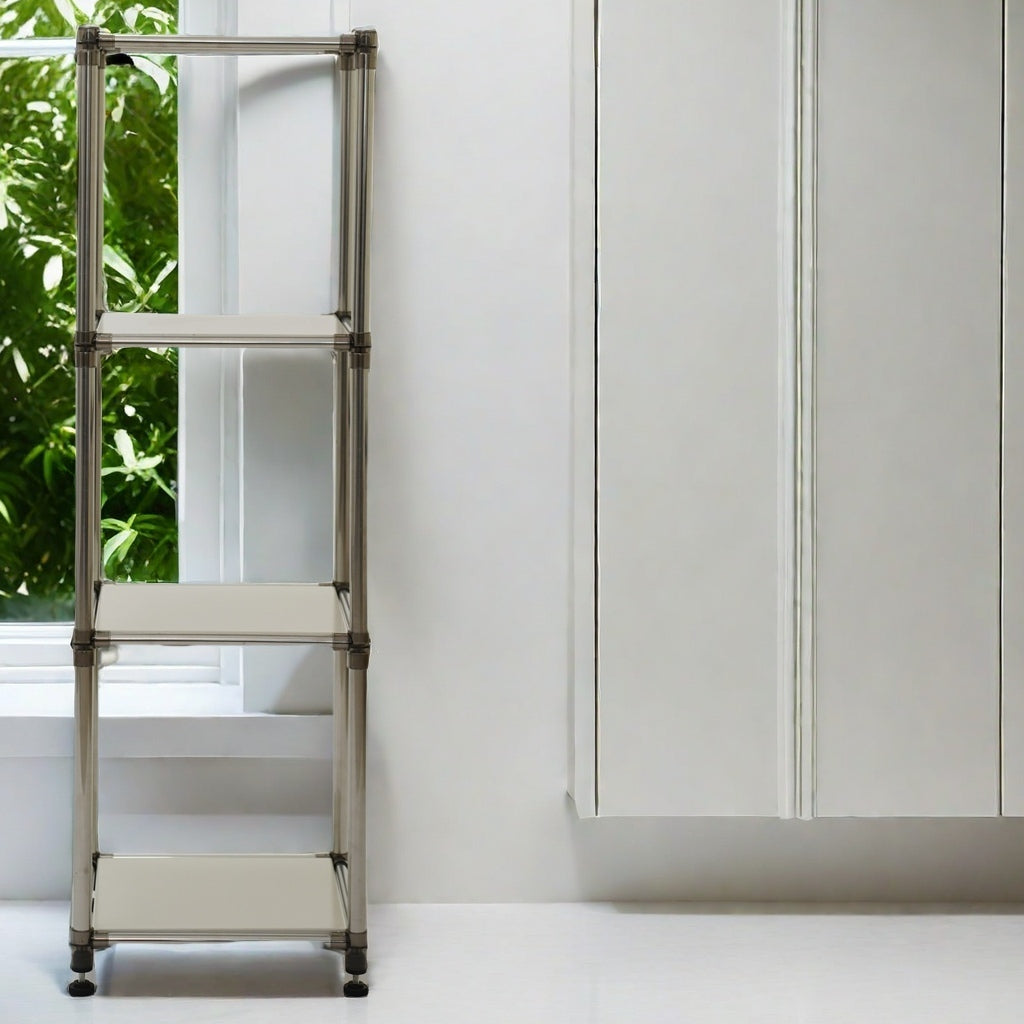 Sleek silver modular shelving unit with three beige shelves by a window