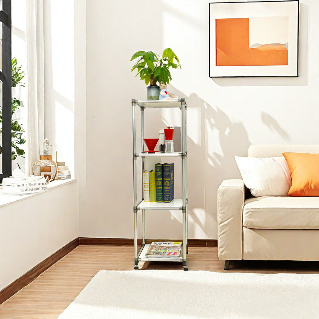 Silver tier shelving unit with wheels holding books and kitchenware