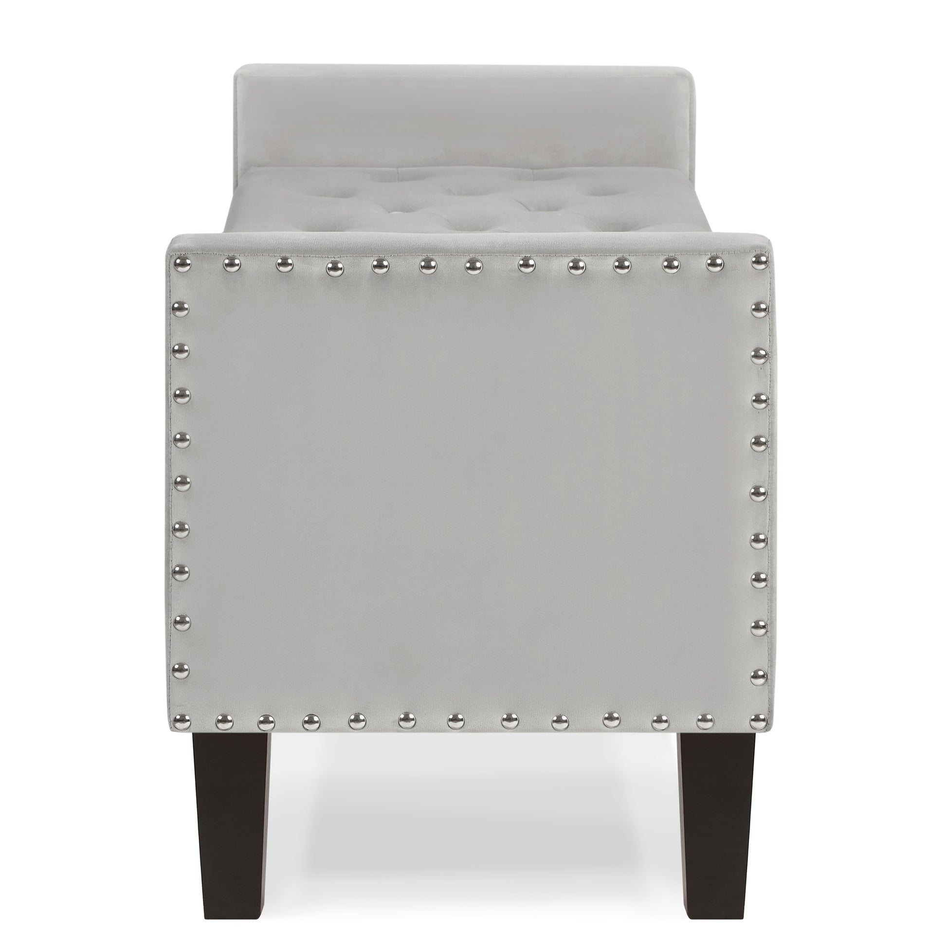 Tufted grey velvet ottoman bench with silver nailhead trim and dark wood legs