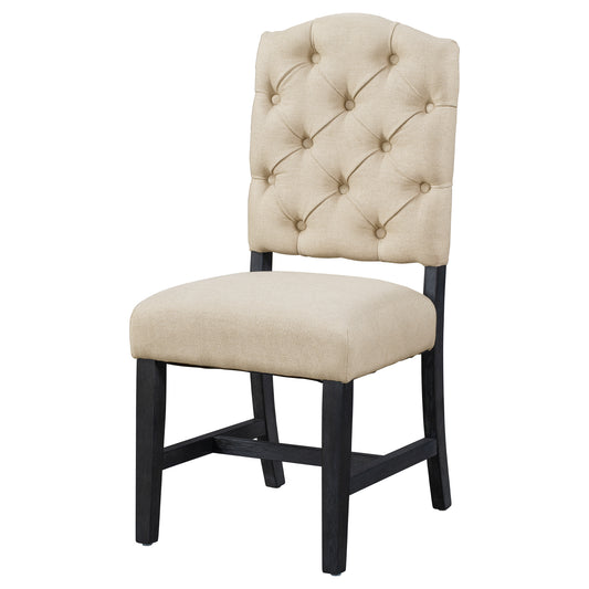 Tufted beige fabric dining chair with dark wood legs and curved back