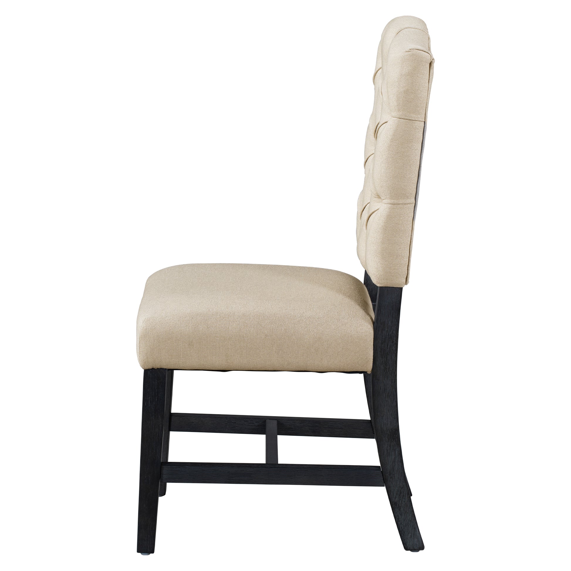 Tan upholstered dining chair with tufted back and dark wood legs