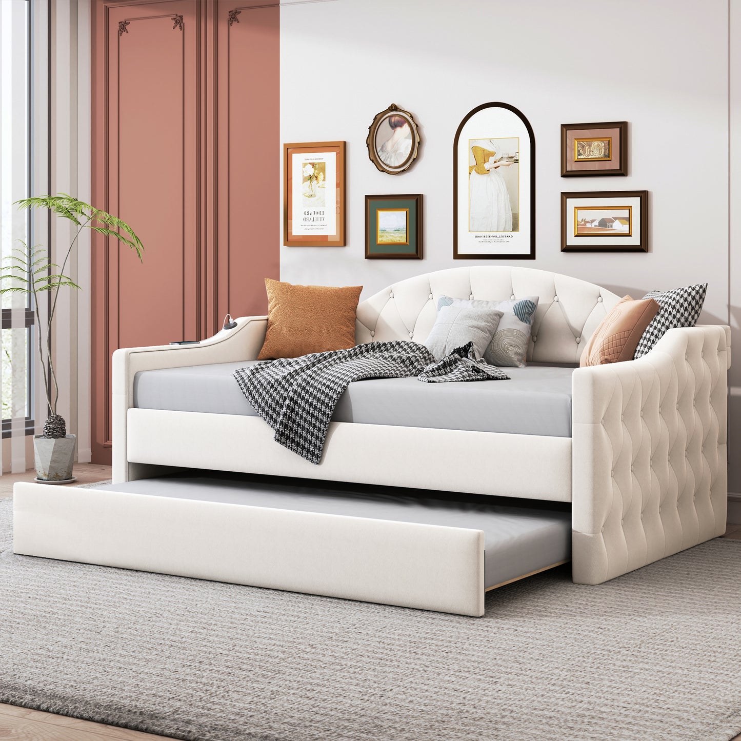 Cream upholstered daybed with tufted back and pullout trundle