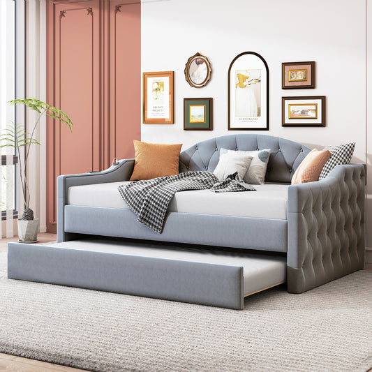 Light blue velvet daybed with trundle and tufted design