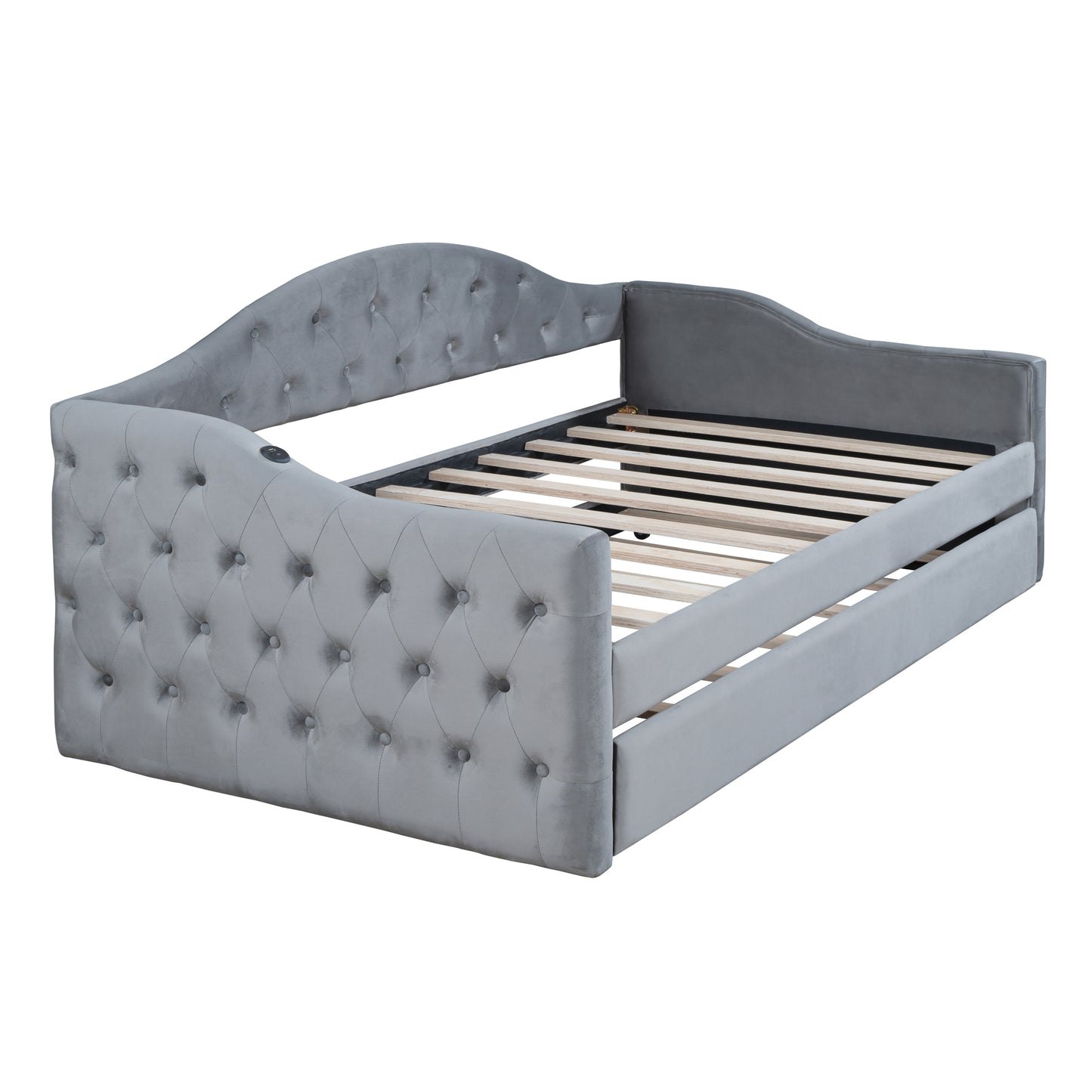Grey velvet tufted daybed with ornate curved headboard and footboard