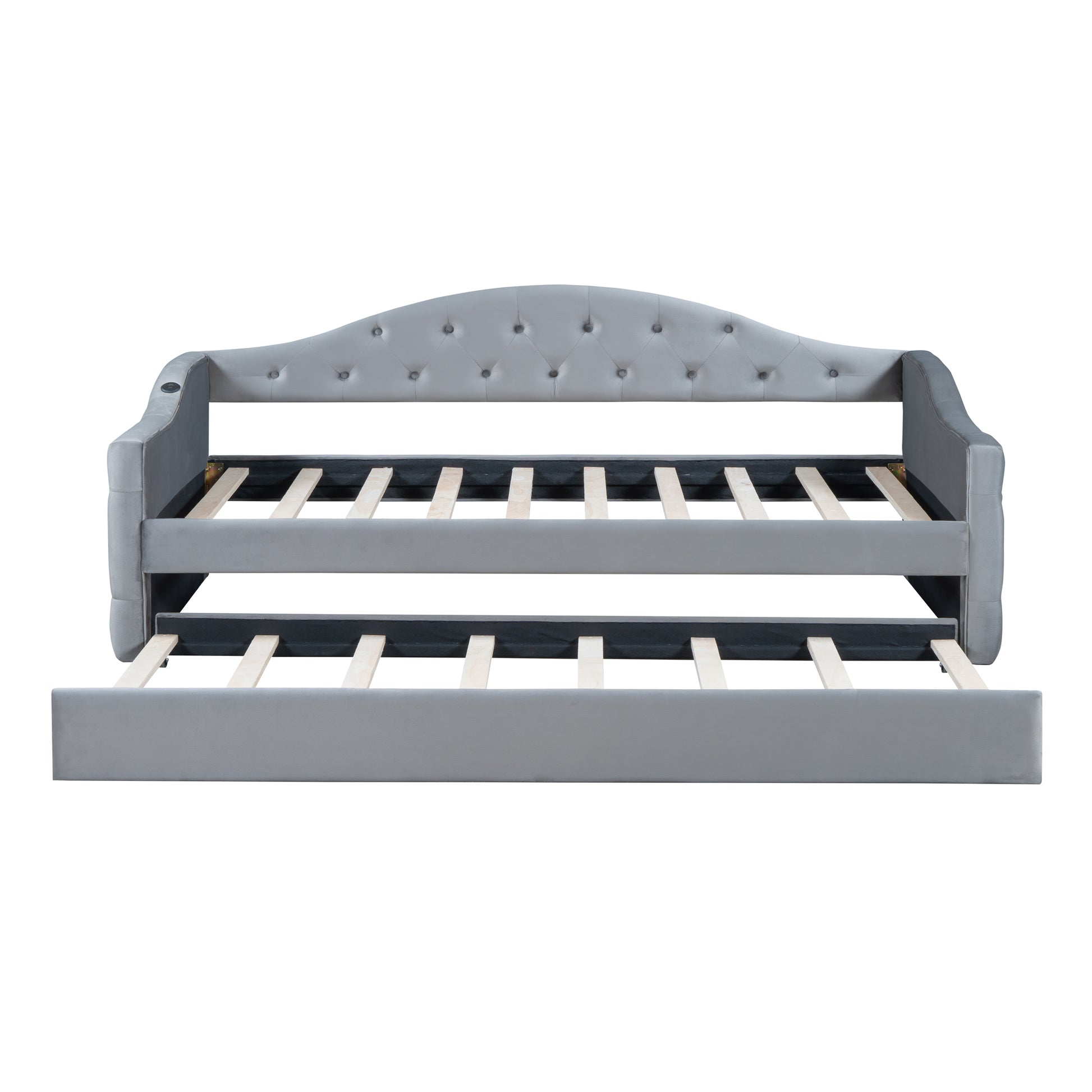 Grey velvet daybed with tufted back and pullout trundle for extra seating