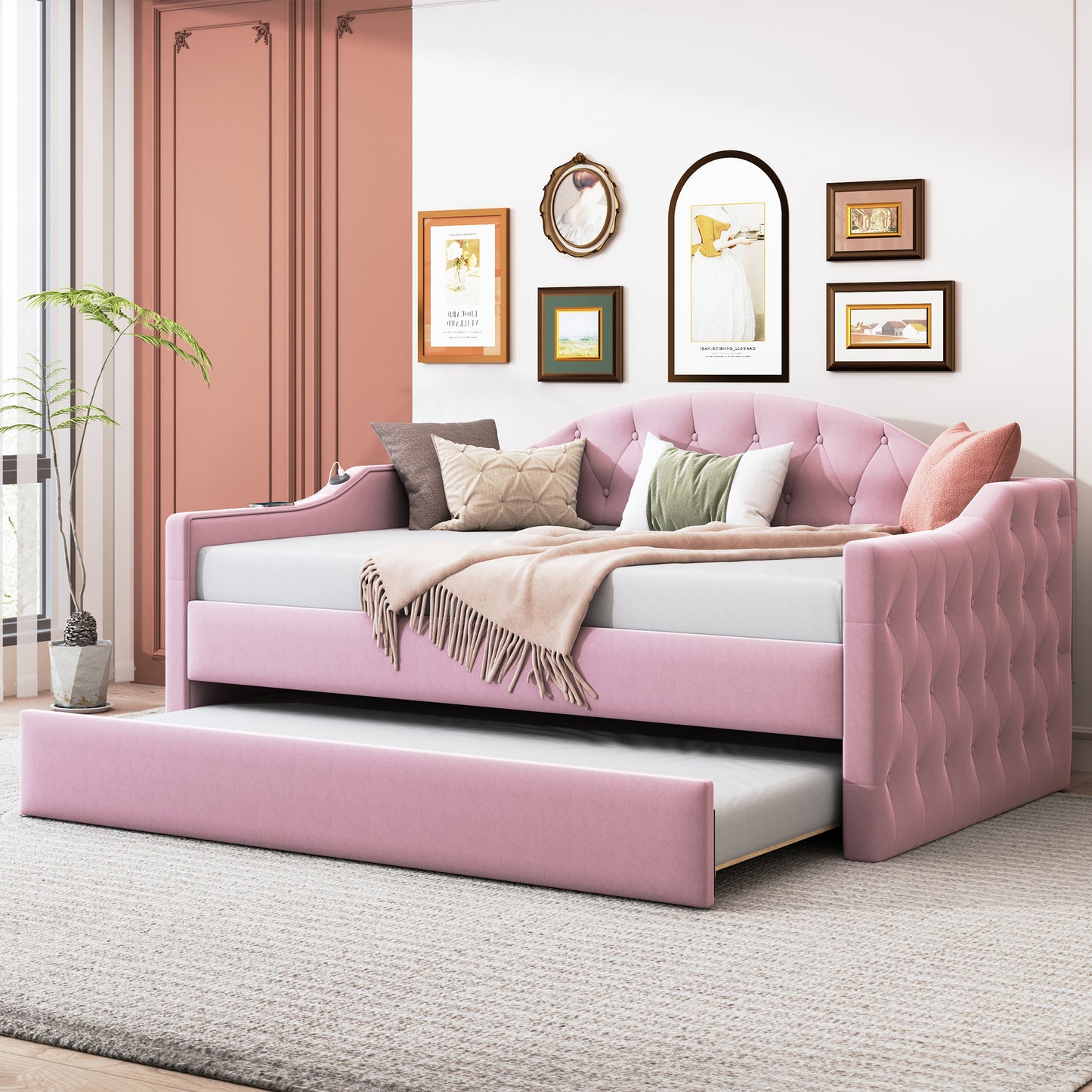 Pink velvet daybed with pullout trundle tufted details and plush throw