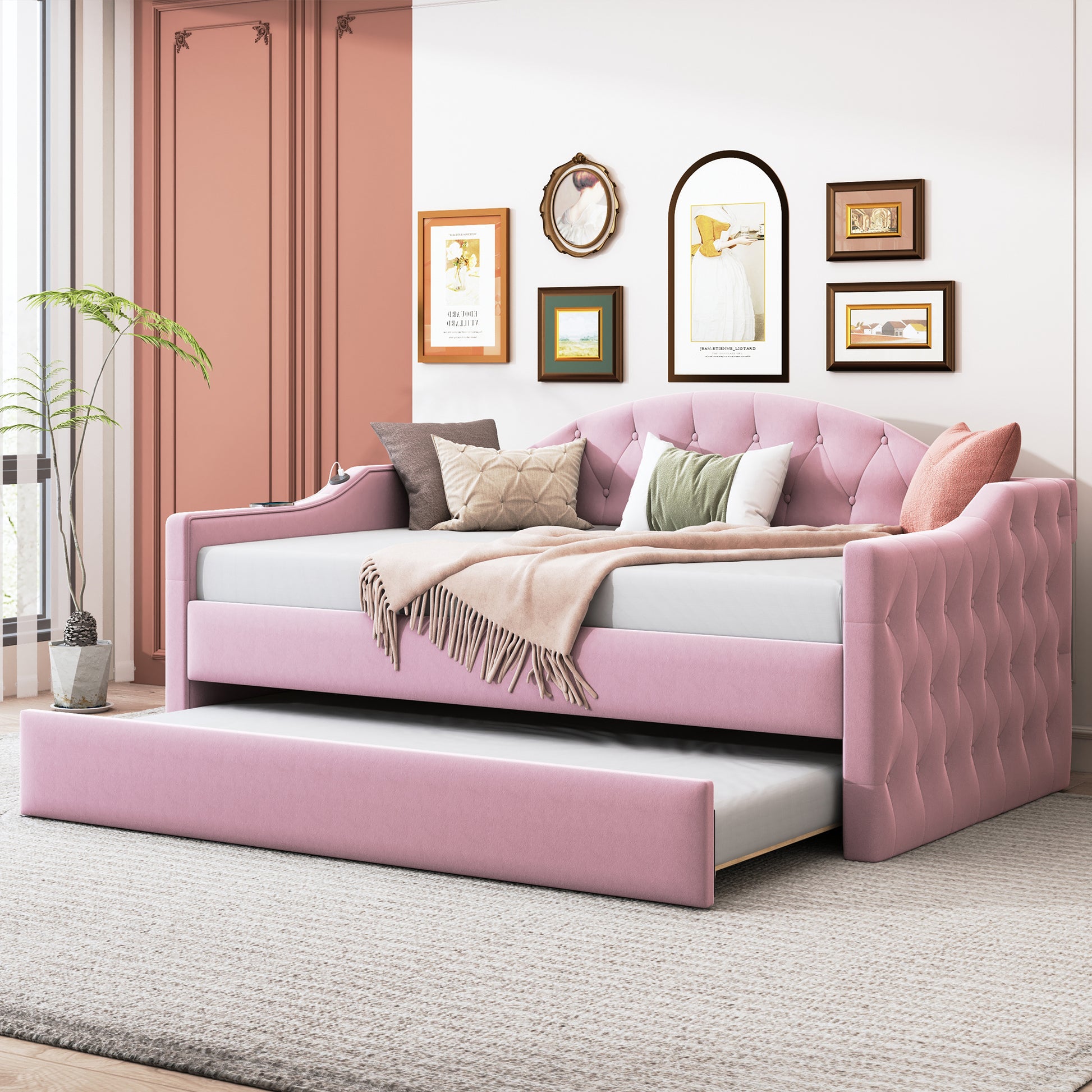 Pink velvet daybed with pullout trundle tufted details and plush throw