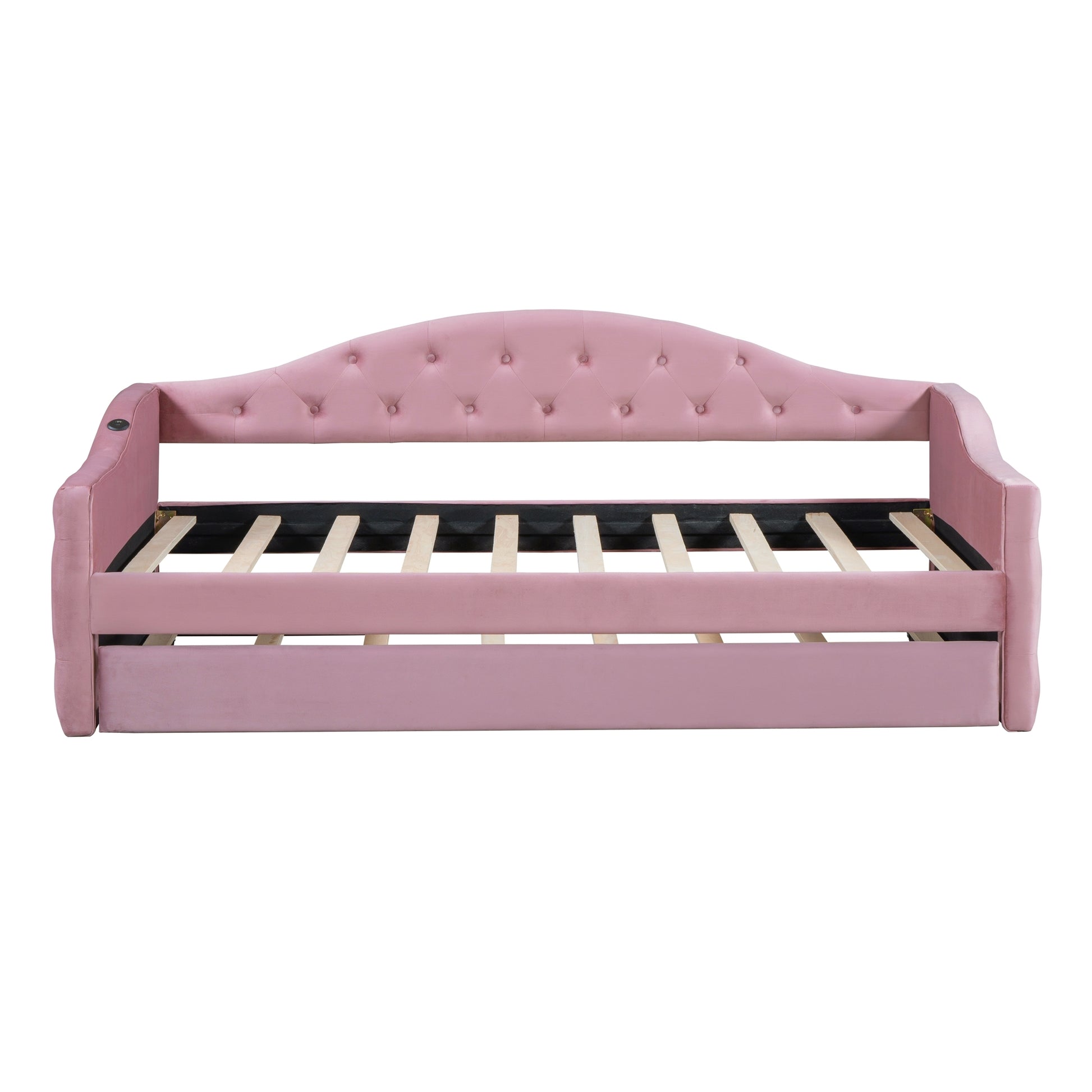 Tufted pink velvet daybed with integrated USB port and slatted frame
