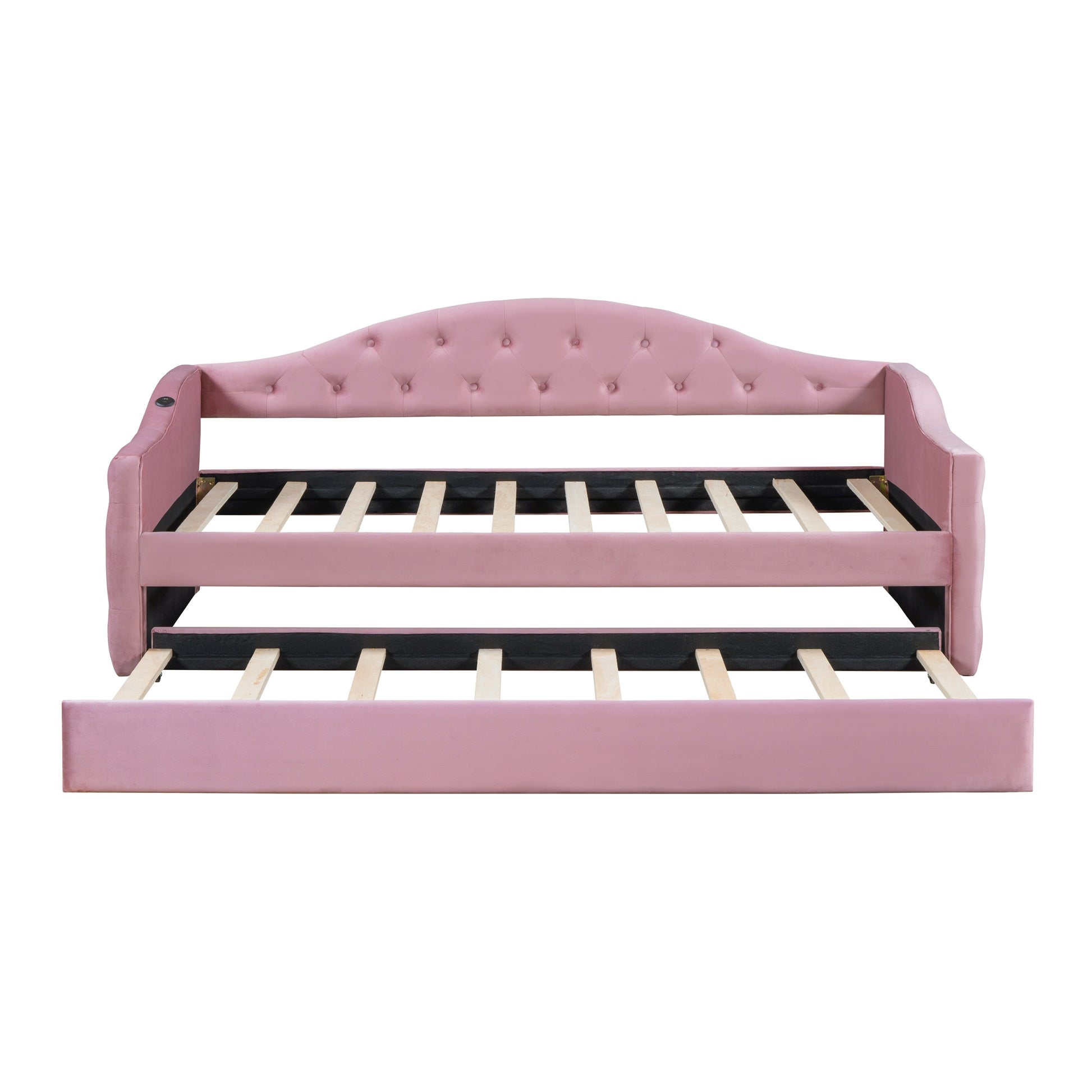 Pink velvet daybed with tufted back and pullout trundle