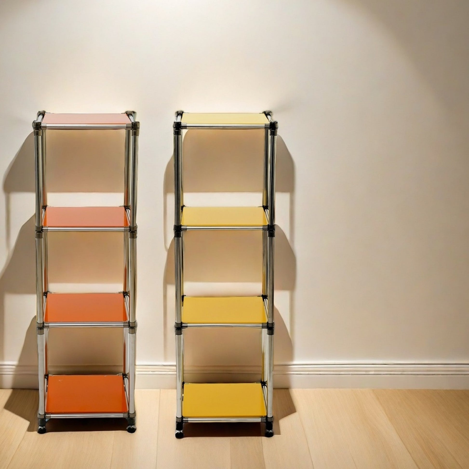 Orange modular shelving unit with chrome frame and wheels