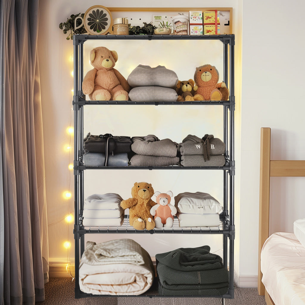 Black tier metal storage shelf with folded clothes and teddy bears