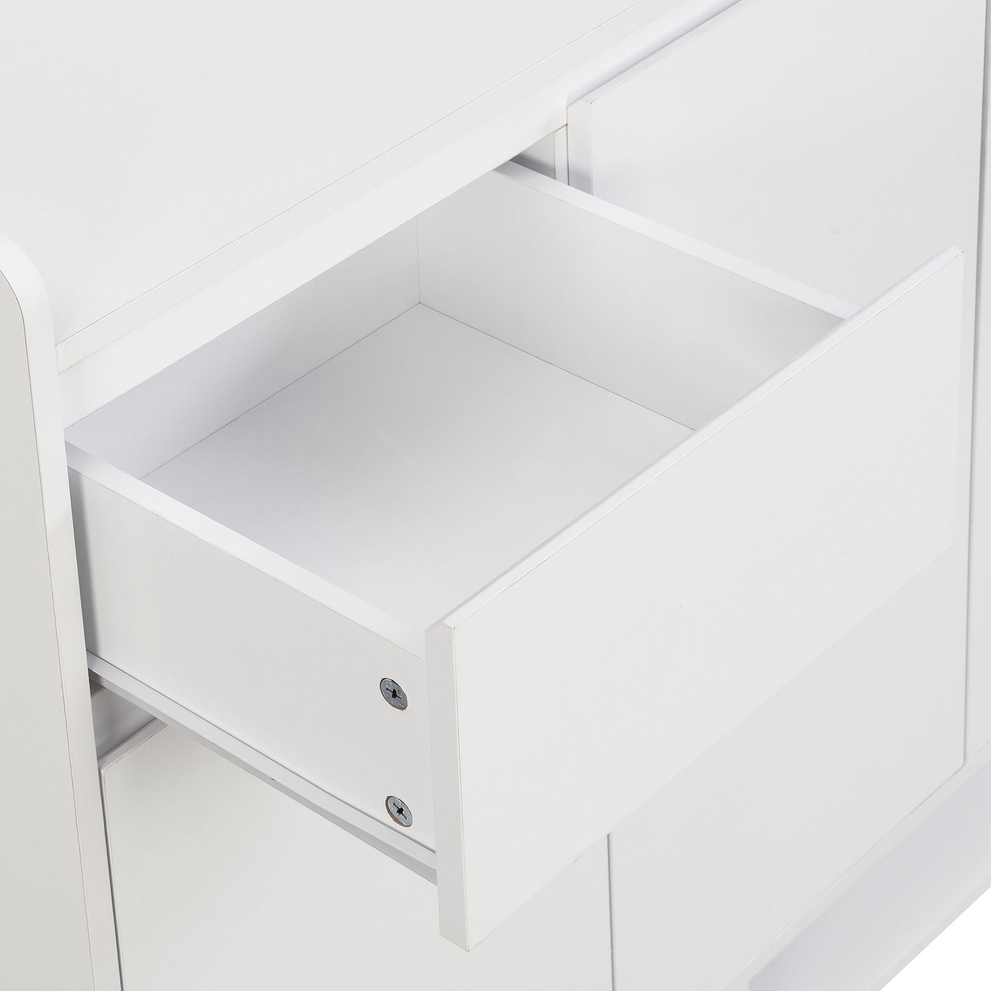 White modern dresser with an open drawer showing its smooth interior