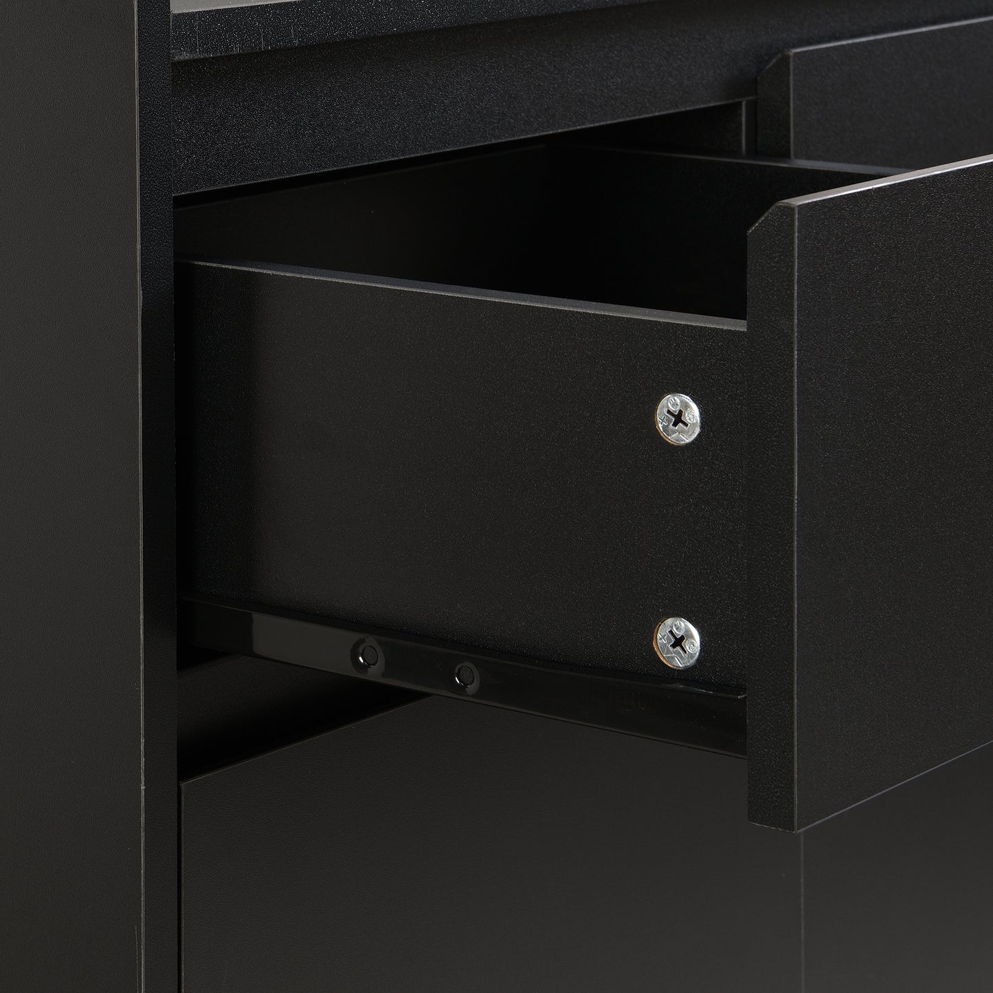 Black metal filing cabinet drawer with visible slide rails