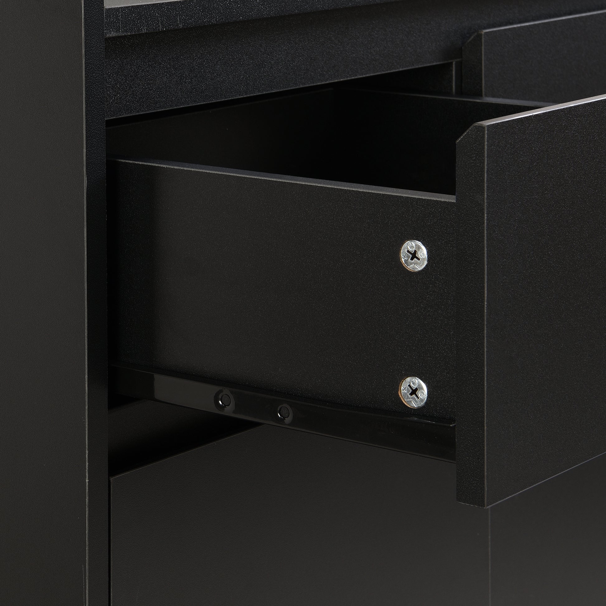 Black metal filing cabinet drawer with visible slide rails