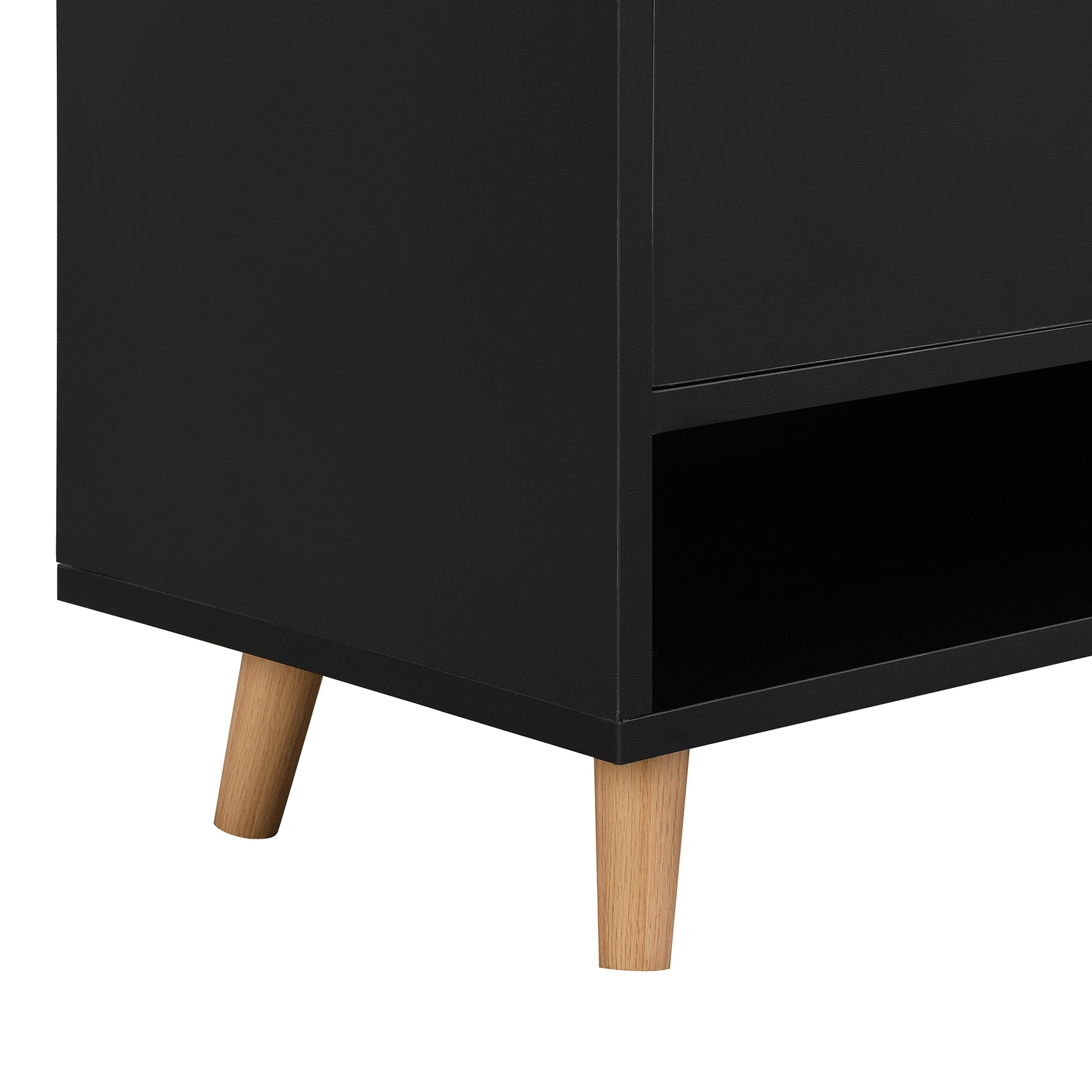 Black media console with tapered wooden legs