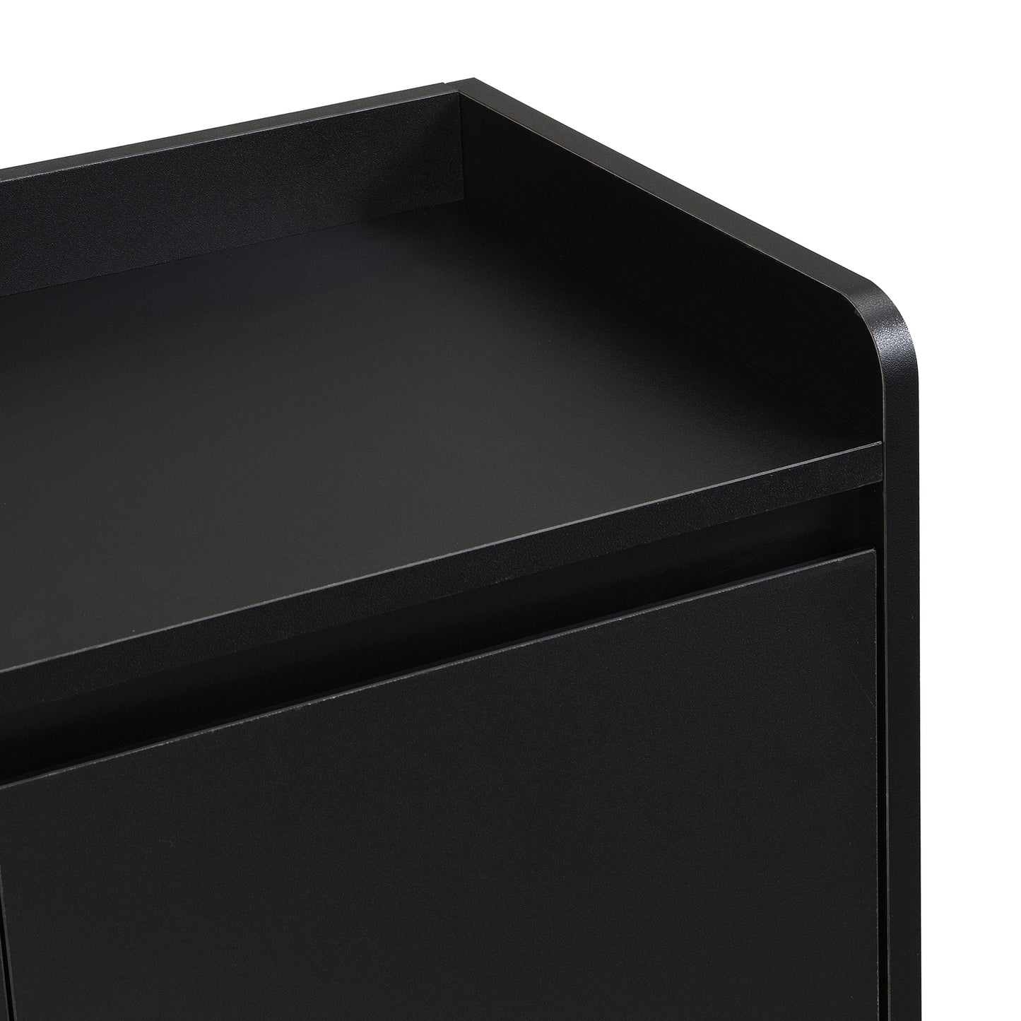 Closeup of a modern black entryway bench with a textured finish and clean lines
