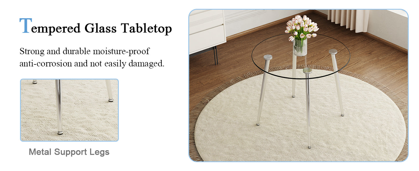 Round tempered glass coffee table with silver metal legs on a cream rug