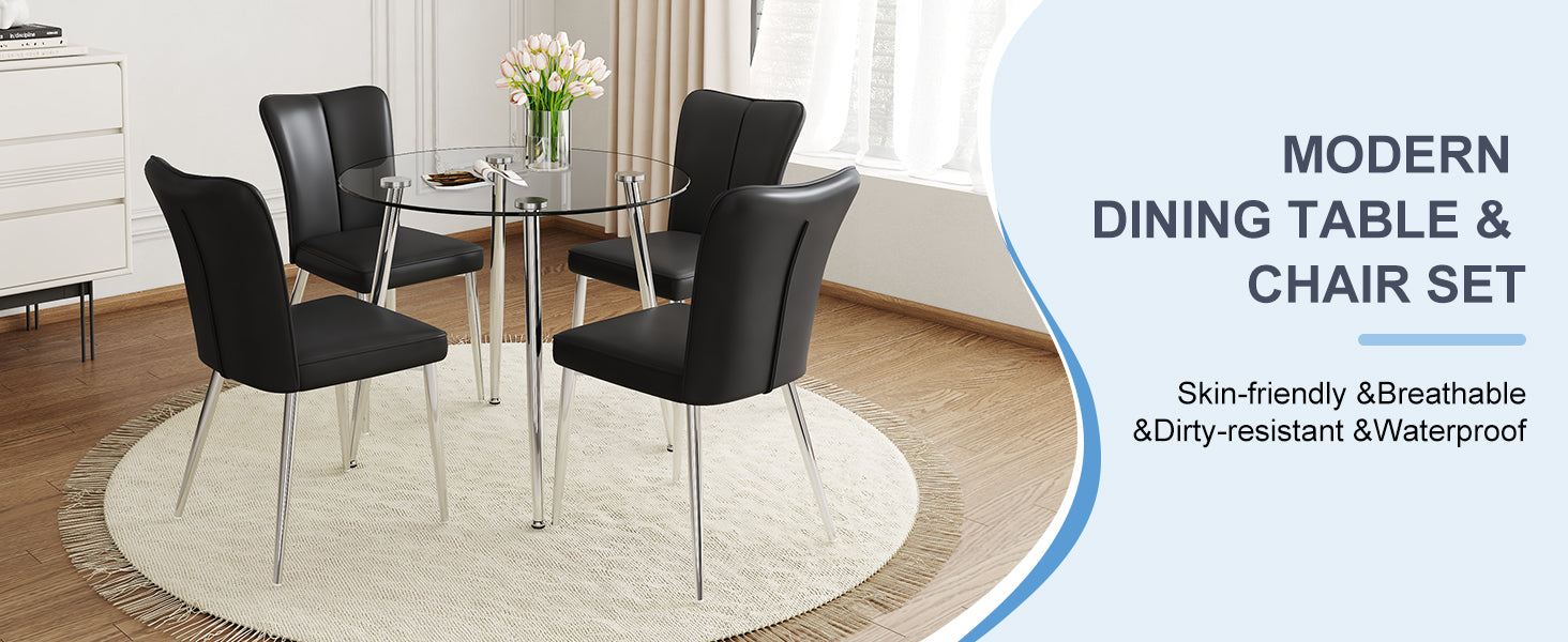 Black faux leather dining chairs and round glass tabletop with chrome legs