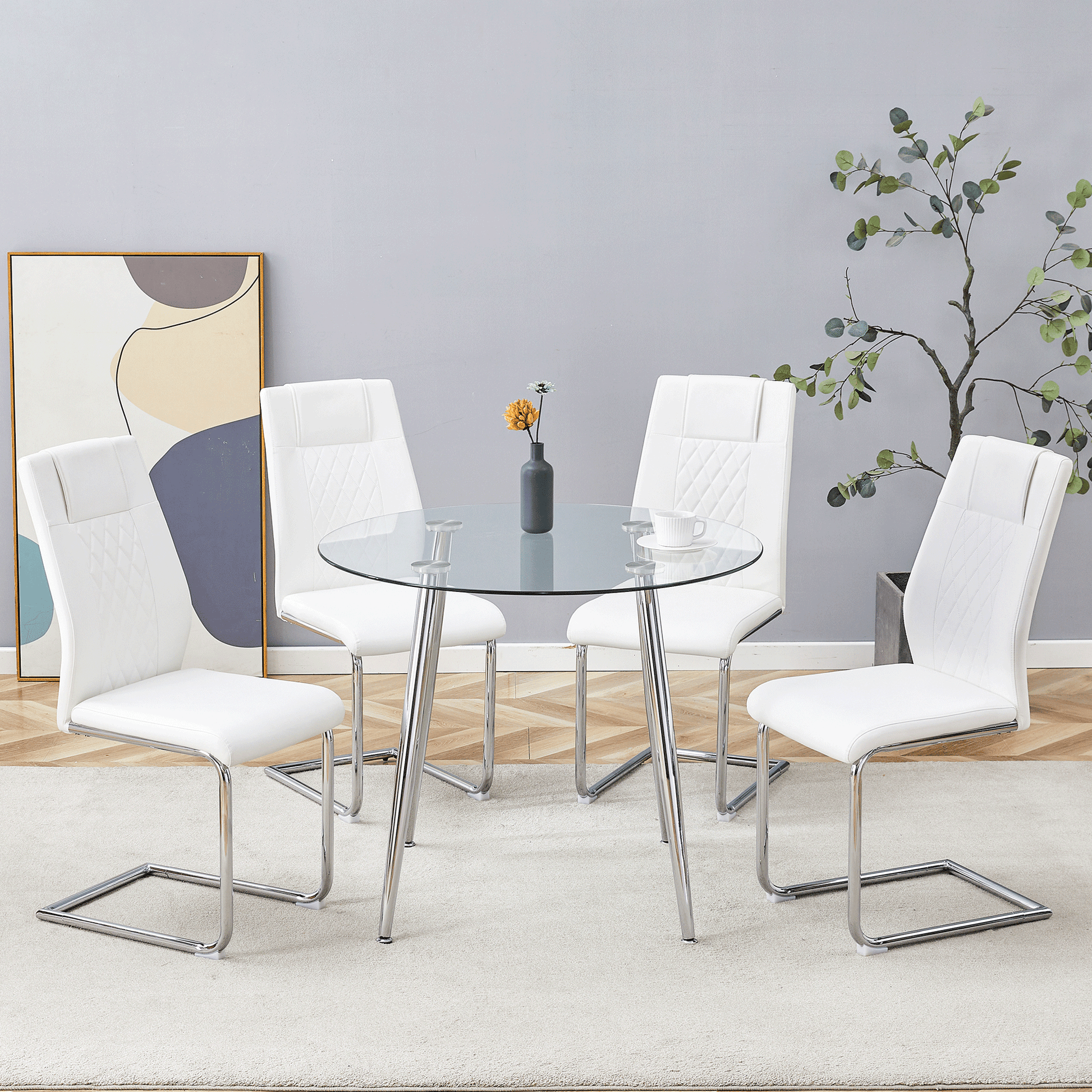 White leather dining chairs with diamond stitching surround a round glass table with chrome legs