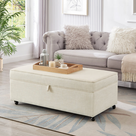 Beige linen storage ottoman with casters and wooden tray on top