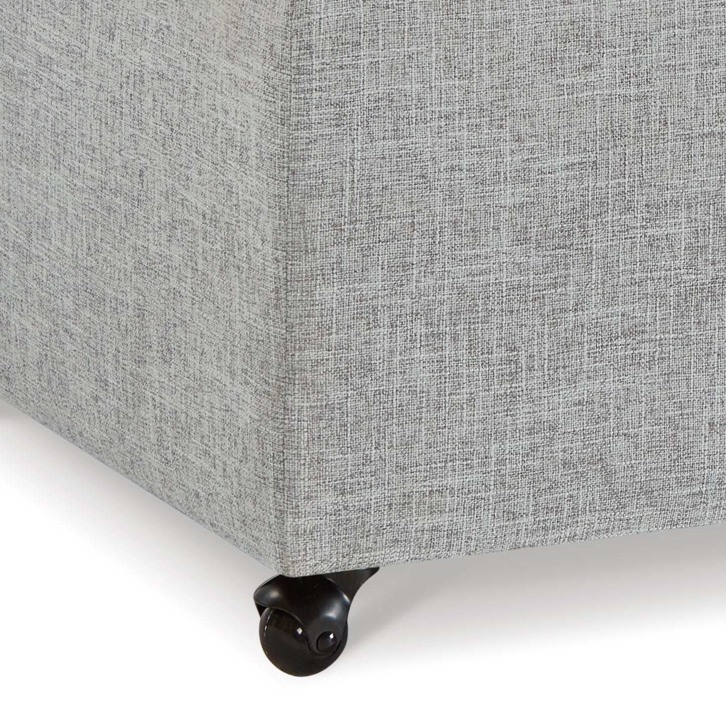Grey linen fabric ottoman with black caster wheels