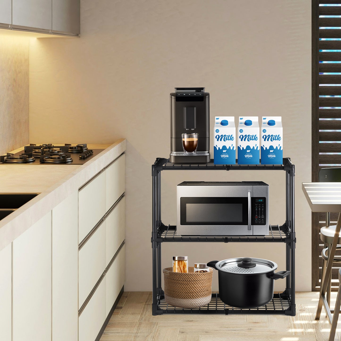 Black threetier wire shelving unit organizing kitchen appliances and cookware
