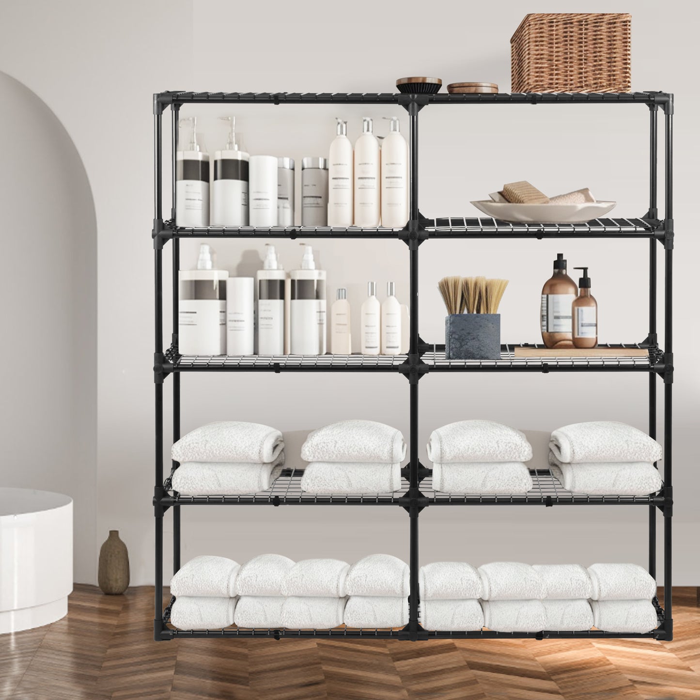 Black metal wire shelving unit holding toiletries and towels