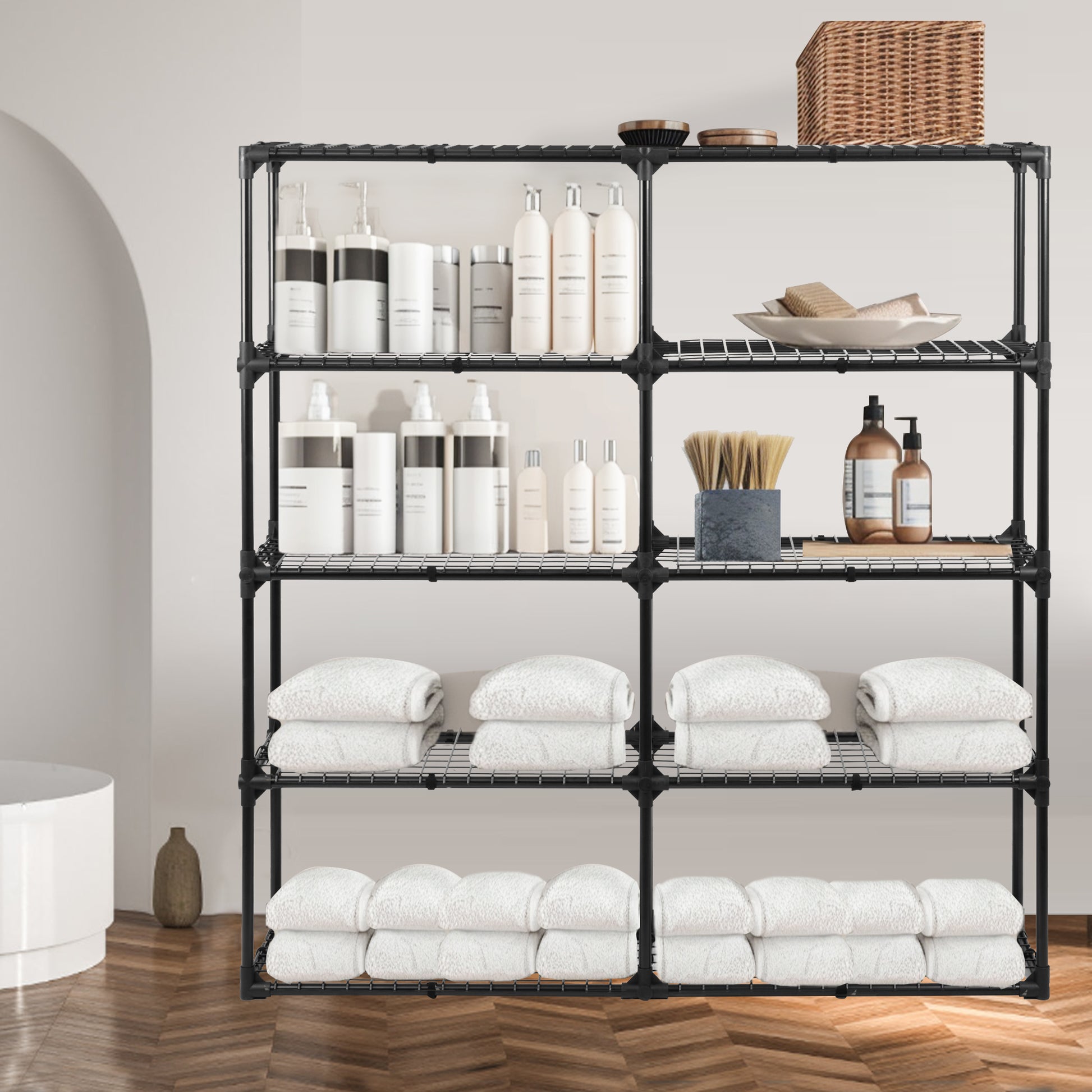 Black metal wire shelving unit holding toiletries and towels