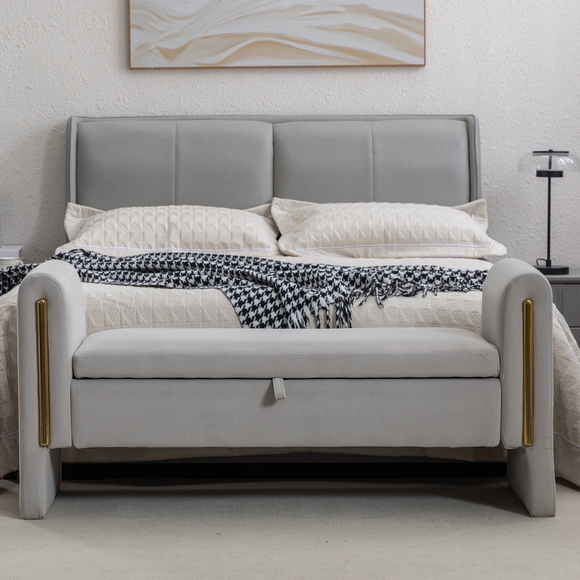 Light gray velvet storage bench with gold accents