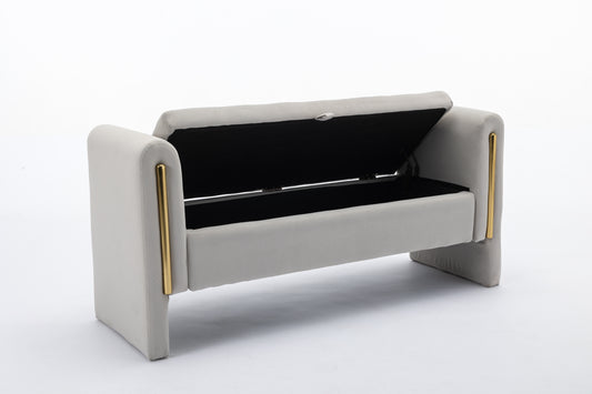 Light gray velvet storage bench with gold accents