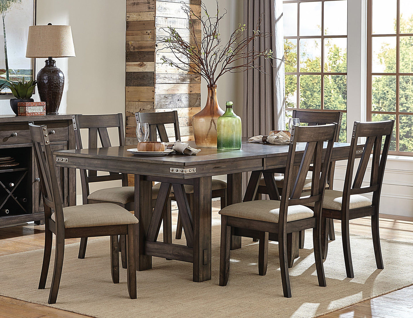Rustic brown dining table with upholstered chairs