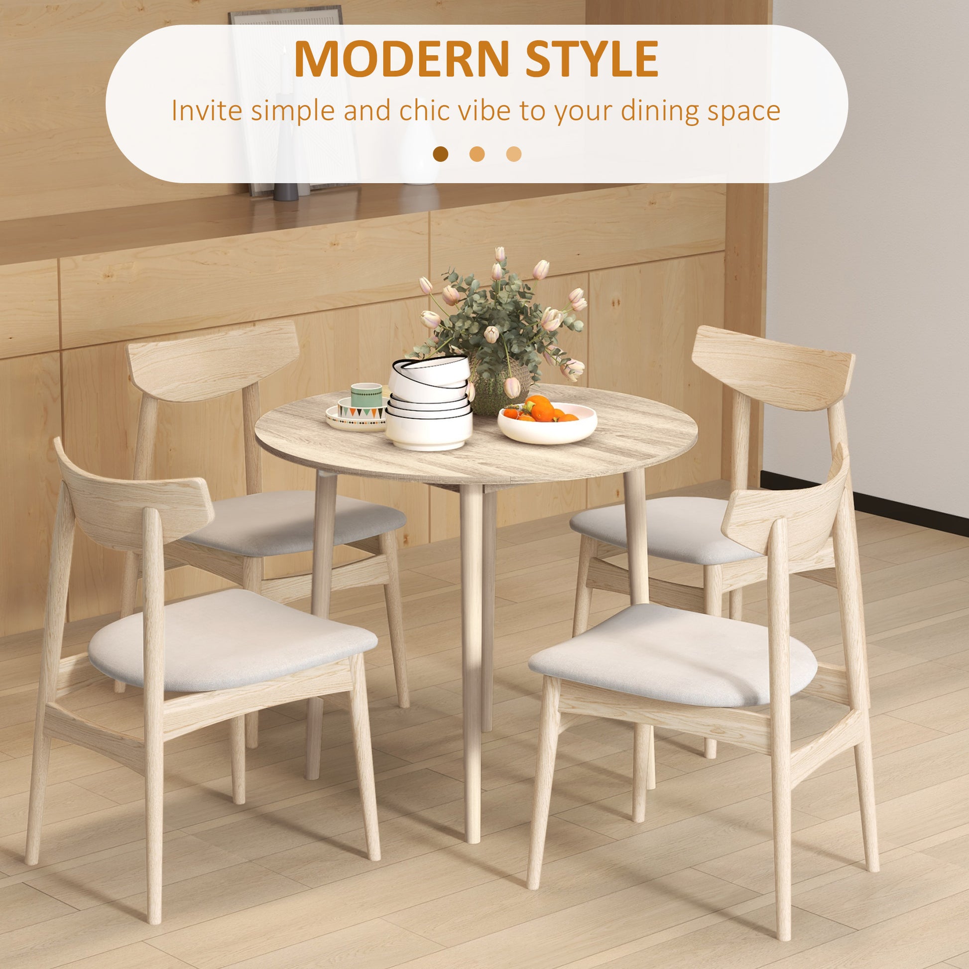 Light wood dining chairs with comfortable fabric seats arranged around a round table