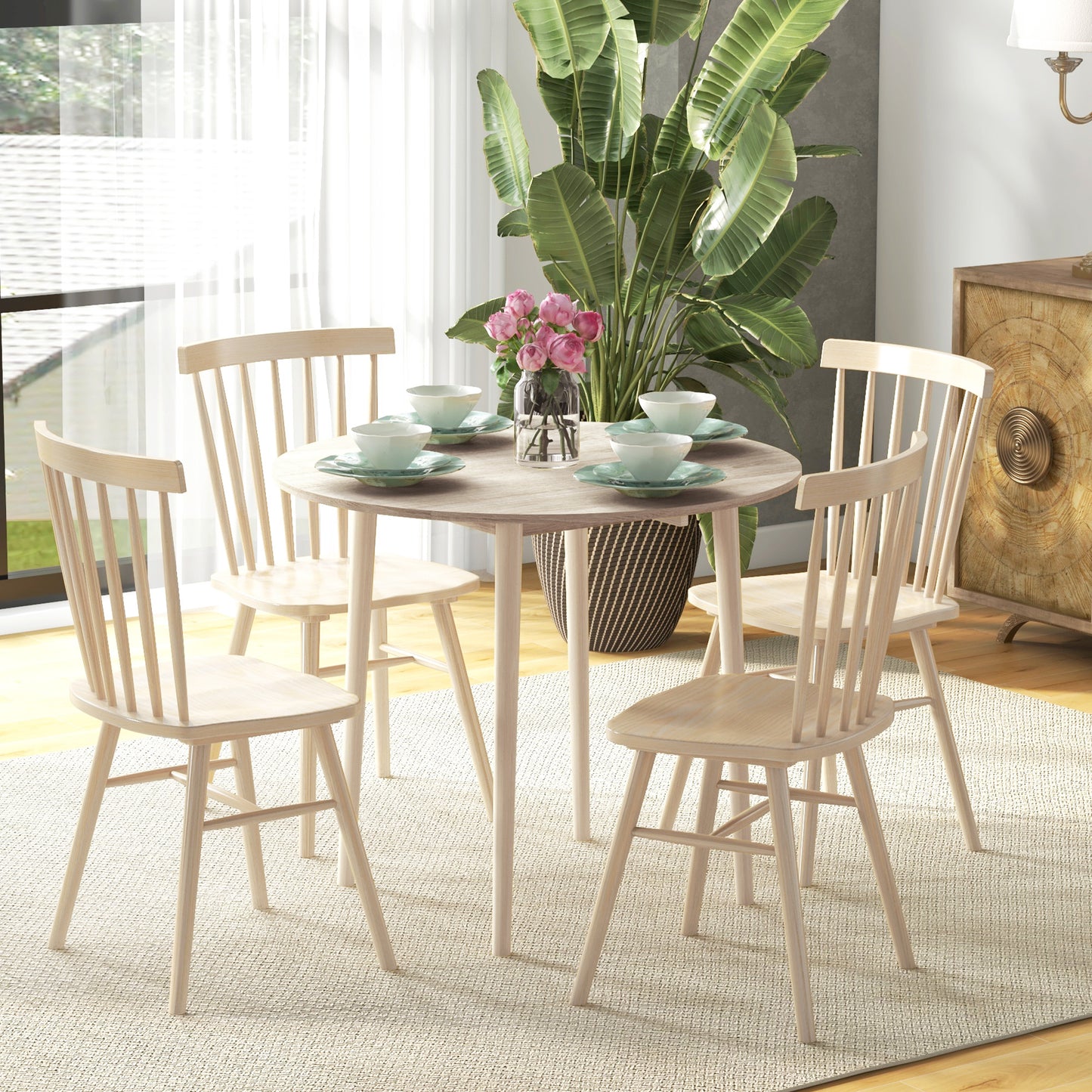 Light wood dining set with spindle back chairs