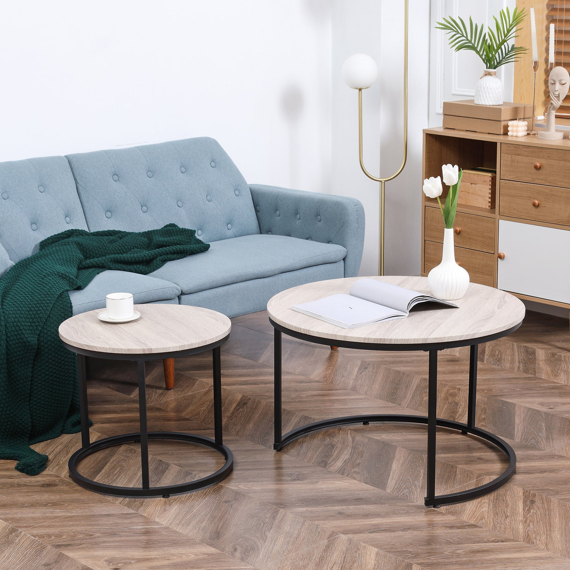 Round wood veneer coffee table set with black metal legs