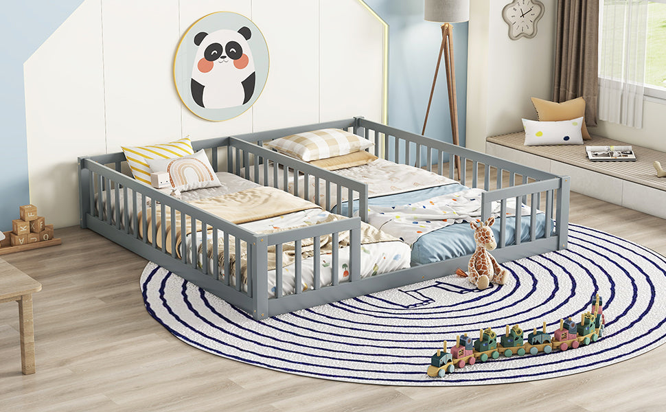 Gray twin toddler bed with rails and playful bedding