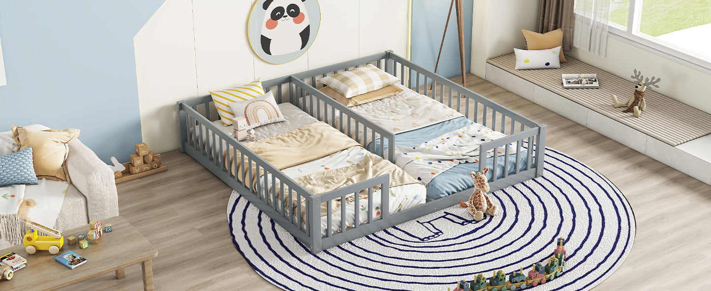 Gray wooden toddler bed with safety rails