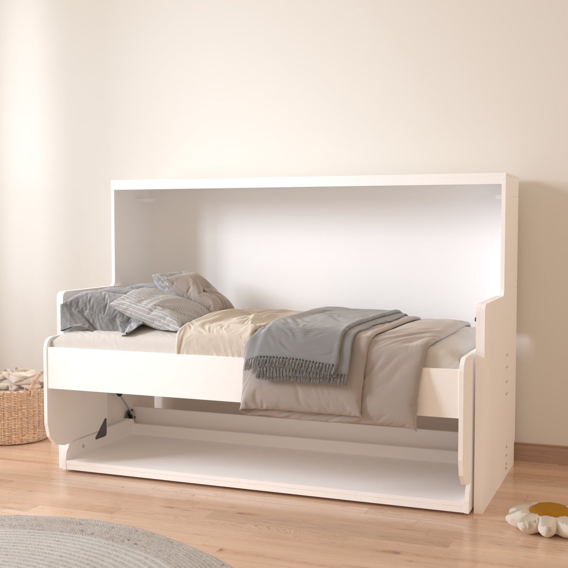 White modern daybed with plush pillows and grey throw