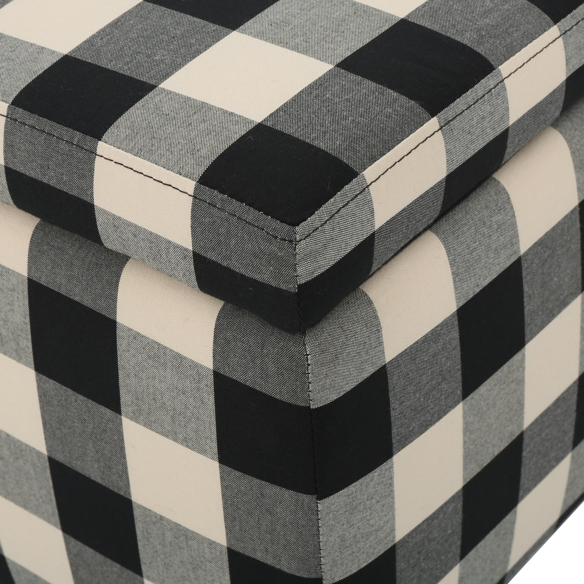 Black and white buffalo plaid fabric ottoman detail