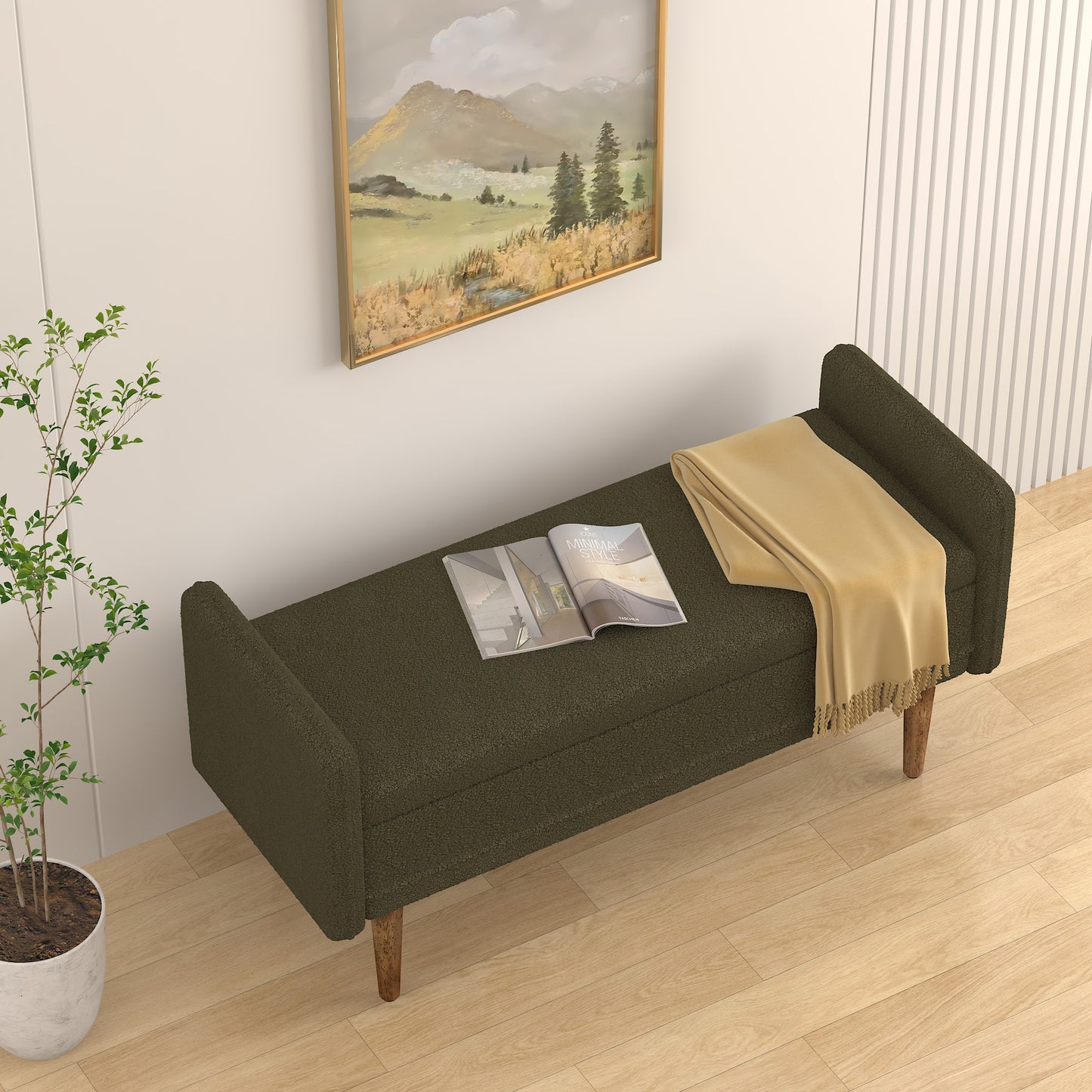 Dark green fabric storage bench with gold throw