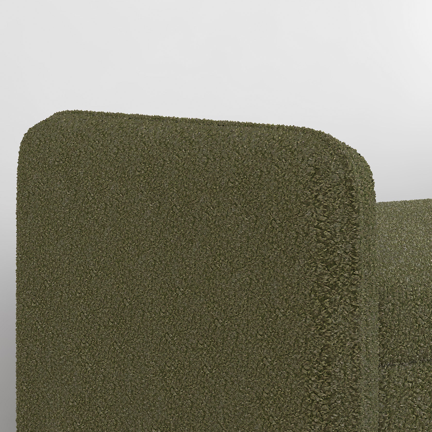 Textured olive green sofa with a rounded armrest